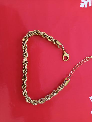 qizil qolbaqlar: Qızılı rəngdə bükülü dizayna malik zəncir qolbaq - Material: metal — 1