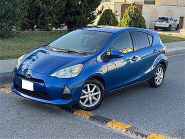 Toyota Prius C (Aqua) hibrid hetçbek - Rəng: mavi metalik - Kuzov: 5 lalafo.az -da Toyota Prius C (Aqua) hibrid hetçbek - Rəng: mavi metalik - Kuzov: 5