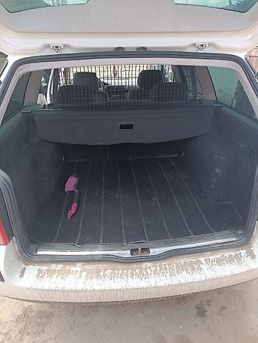салон машины: Volkswagen Passat Variant: 1999 г., 1.6 л, Механика, Бензин, Универсал — 9