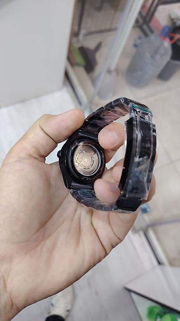 oyster saat: Qara dizaynlı mexaniki qol saatı - Model: üzərində “ROLEX Oyster — 4