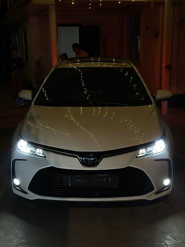 электра машына: Toyota Corolla: 2019 г., 1.8 л, Гибрид, Седан — 1