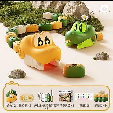 детские машинки: Игровой набор TAODUDU «RC Magnetic Greedy Snake» Что это: - — 2