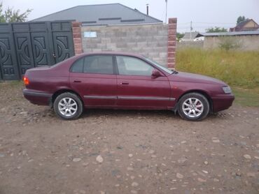расрочка машина бишкек: Toyota Carina E, седан, бордовый цвет. Основные особенности: - Кузов