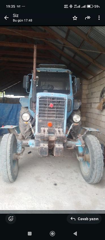 Traktorlar: Mavi rəngli təkərli kənd təsərrüfatı traktoru Texniki xüsusiyyət və — 2