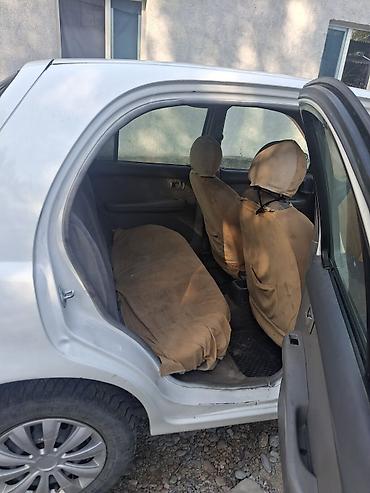Транспорт: Nissan March: 2001 г., 1 л, Автомат, Бензин, Хэтчбэк — 5