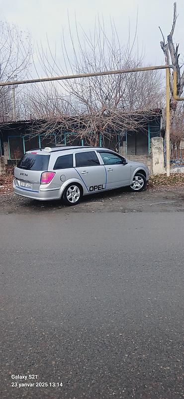 Opel: Opel Astra Caravan (Universal) – benzinli/stansiyon kuzovlu ailə — 1