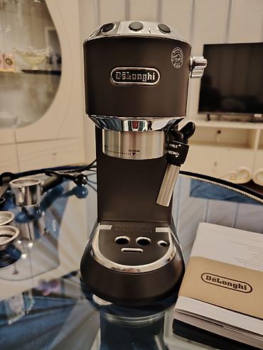 Digər məişət texnikası: Delonghi firmasina aid kofe demleyen aparatdi.Teze mehsuldur — 2