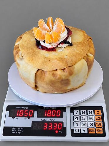 Pankek tortu – üstü mandarin dilimləri, krem və meyvə sousu ilə lalafo.az -da Pankek tortu – üstü mandarin dilimləri, krem və meyvə sousu ilə