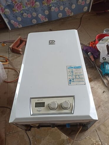 Kombilər: Demir dokum “Atron” qazla işləyən divar tipli kombi/qızdırıcı — 1