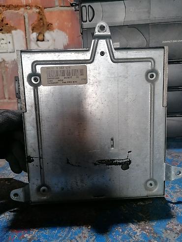 manuel auto: Pojačalo audio sistema BMW E39 – LEAR HIGH - Originalni BMW modul — 1