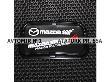 maz təkəri: "mazda" telefon tutacağı bundan başqa hər növ avtomobi̇l