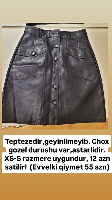 İnformatika: Ön tərəfində düymə bağlaması və iki cib detalı olan, qara rəngli, dəri