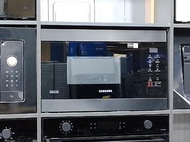 Микроволновая печь Samsung с современным лаконичным дизайном в черном