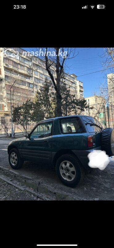 авто в рассрочку без банка без первоначального взноса в бишкеке: Трехдверный внедорожник Toyota RAV4, окрашенный в темно-зеленый цвет