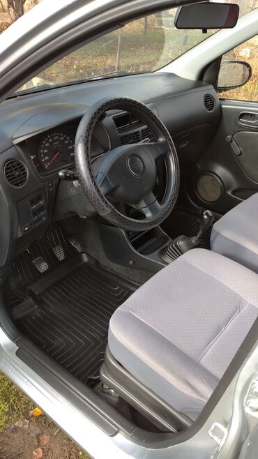 марка 2: Daihatsu Cuore: 2003 г., 1 л, Механика, Бензин, Хэтчбэк