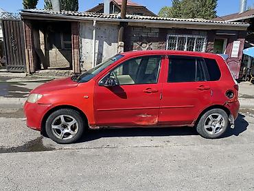 10 5j: Mazda Demio: 2004 г., 1.3 л, Автомат, Бензин, Хэтчбэк — 7