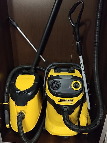 Пылесосы Karcher для сухой и влажной уборки. Модель справа: Karcher