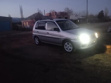 Mazda: Mazda Demio: 1999 г., 1.3 л, Автомат, Бензин, Седан