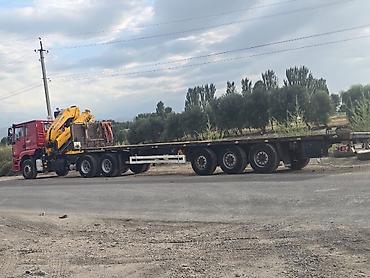Услуги услуга манипулятор - Тягач с установленным гидроманипулятором
