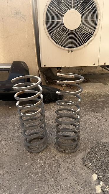 Podveska, xodovoy hissələri: Məhsul: Avtomobil üçün arxa asqı yayları (cüt) Təsvir: - Metal spiral — 1
