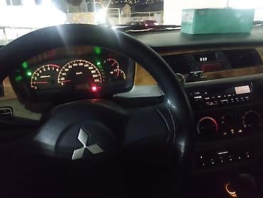 balaca maşın: Mitsubishi Lancer: 1.6 l | 2007 il 280 km Sedan — 4