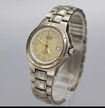 Aksesuarlar: Seiko Solar Titan qol saatı - Model və mexanizm: Seiko Solar – günəş — 1