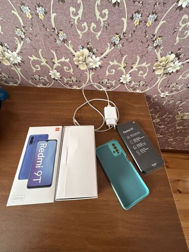 Xiaomi: Xiaomi Redmi 9T, 4 GB, rəng - Yaşıl, 
 Barmaq izi