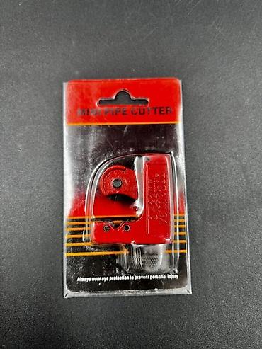 Rezaklar: Turba kəsən qırmızı balaca Bu boru kəsici alət (pipe cutter), metal — 3