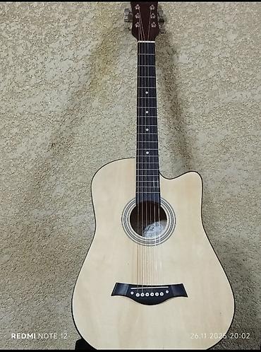 Гитары: Акустическая гитара с вырезом (cutaway), форма корпуса Dreadnought — 3