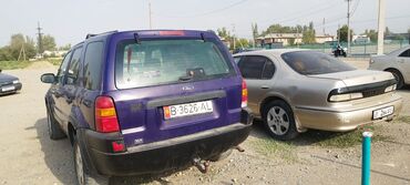 форд ескапе: Внедорожник Ford Escape синего цвета с рейлингами на крыше и фаркопом