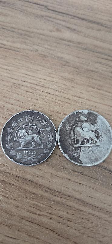 qıra: 1.Pəhləvi dövrü (1926-cı il / 1305): 2 Qıran (2000 Dinar). Məşhur "Şir — 2