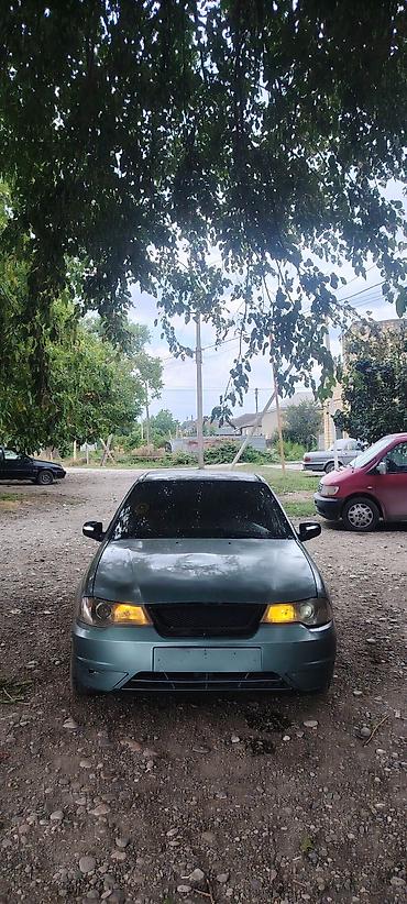 Daewoo: Model: Daewoo Nexia (sedan) Rəng: yaşıl/boz metalik Kuzov: 4 qapı — 1
