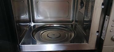 Paslanmayan poladdan hazırlanmış mikrodalğalı soba. Xüsusiyyətlər: -