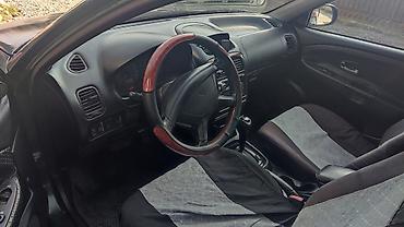 купить мазерати: Mitsubishi Carisma: 1999 г., Бензин, Седан — 10