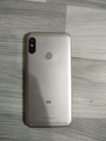 mi modem: Xiaomi Mi A2 Lite, 32 ГБ, цвет - Золотой, 
 Кнопочный, Отпечаток пальца, Две SIM карты