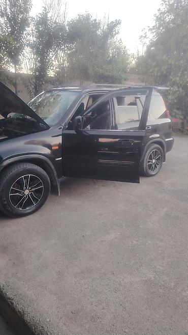 islenmis hyundai avtomobilleri satisi: Honda CR‑V, qara rəng, 1-ci nəsil kuzov (təxmini 1997–2001). - Kuzov — 9
