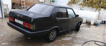 Tofas: Tofaş Şahin sedan – qara rəng, 4 qapı, arxa ötürücülü. Xüsusiyyətlər — 4