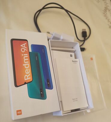 2 ci el telefonlar lalafo: Xiaomi Redmi 9A, 32 GB, rəng - Göy, 
 Barmaq izi, İki sim kartlı, Face ID