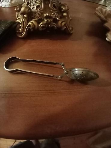 doktor sekilleri: Məhsul: Metal çay süzgəci qaşıq (qıscalı model) Təsvir: - Gevşək çay — 2
