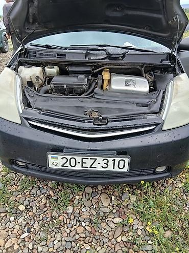 Toyota: Toyota Prius – hibrid hetçbek - Rəng: tünd boz (metallik) - Kuzov: 5 — 9