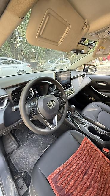 машина гибрид марки: Toyota Corolla: 2019 г., 1.8 л, Вариатор, Гибрид, Седан — 7