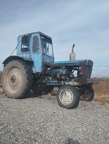 qarmoska boru: Məhsul: Traktor Təsvir: - Korpus: Klassik mavi kabinalı traktor — 1