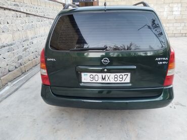 Opel: Opel Astra Caravan (universal) – tünd yaşıl rəng • Kuzov: universal — 6