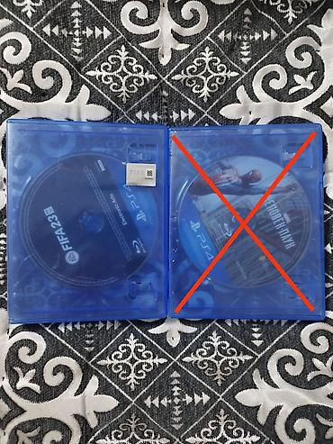 Игровые диски для PlayStation 4 (Blu‑ray), два тайтла: - FIFA 23 (EA