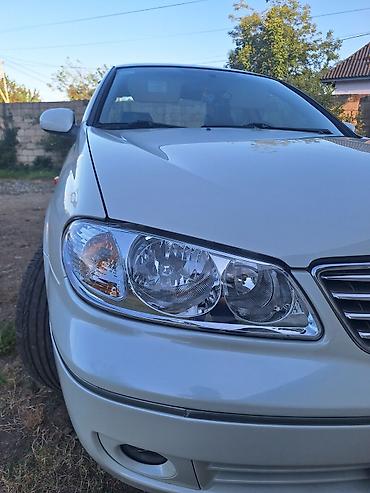 hyundai i30 oluxanası: Nissan Sunny: 1.6 l | 2007 il Sedan — 4