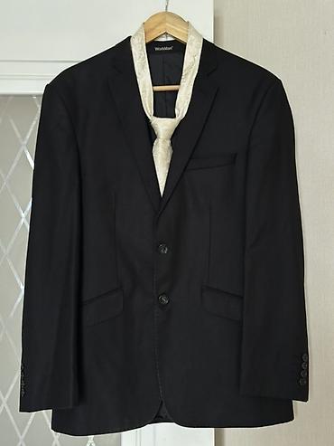 Костюмы: Классические мужские пиджаки темных оттенков. Цены начинаются от — 1