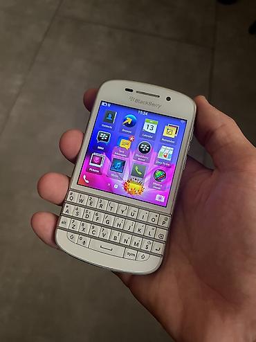 Мобильные телефоны: Ежевика Q10, цвет - Белый — 1