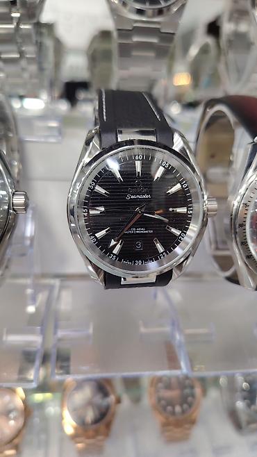 kostuyum: OMEGA kişi qol saatları – Seamaster və Speedmaster kolleksiyaları — 2