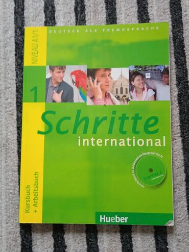 книги по немецкому: Schritte 1 Учебник немецкого языка + рабочая тетрадь 
Уровень А1
