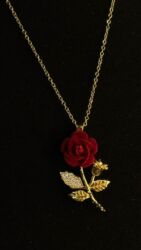 yaqut qaşlı uzuk: Qadın bəzək dəstləri və aksesuarları 1) Qızıl rəngli zəncir üzərində